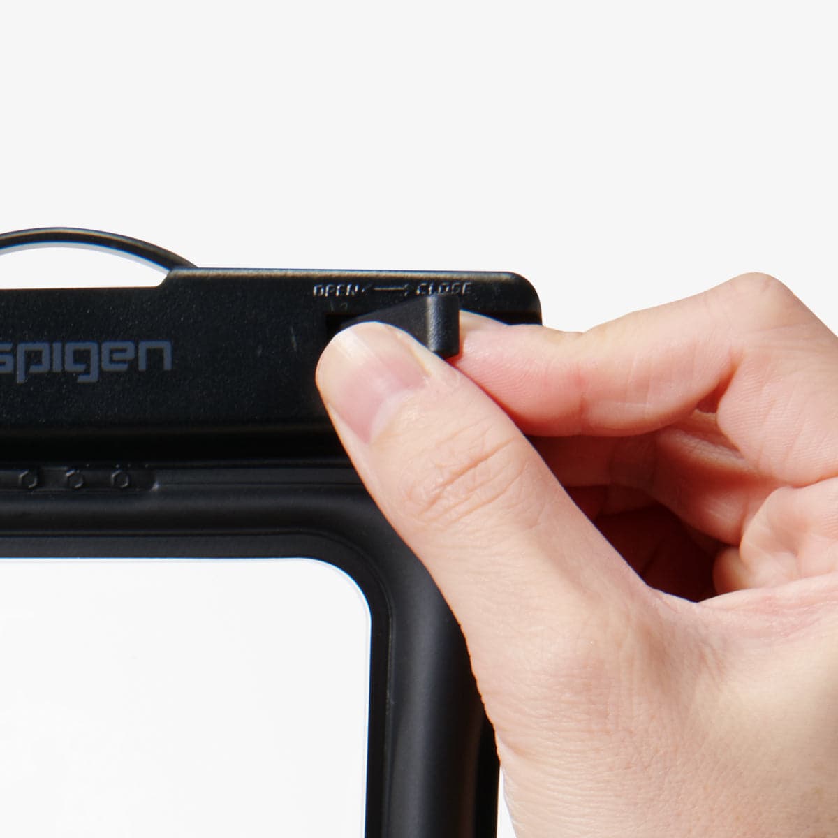 AMP04527 - AquaShield Waterproof Floating Case (2 Pack) A610 in Black showing the how to open the waterproof case by pulling the clip to open Edit alt text