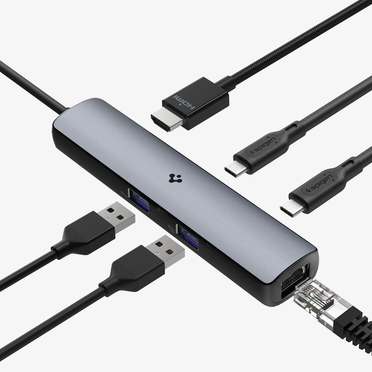 ACA06193 - ArcDock Pro Multi Hub 6-in-1 PD2302 in Space Gray showing the top and sides with USB 3.0 and a Ethernet port, multiple USB cable heads hovering in front of the hub input ports