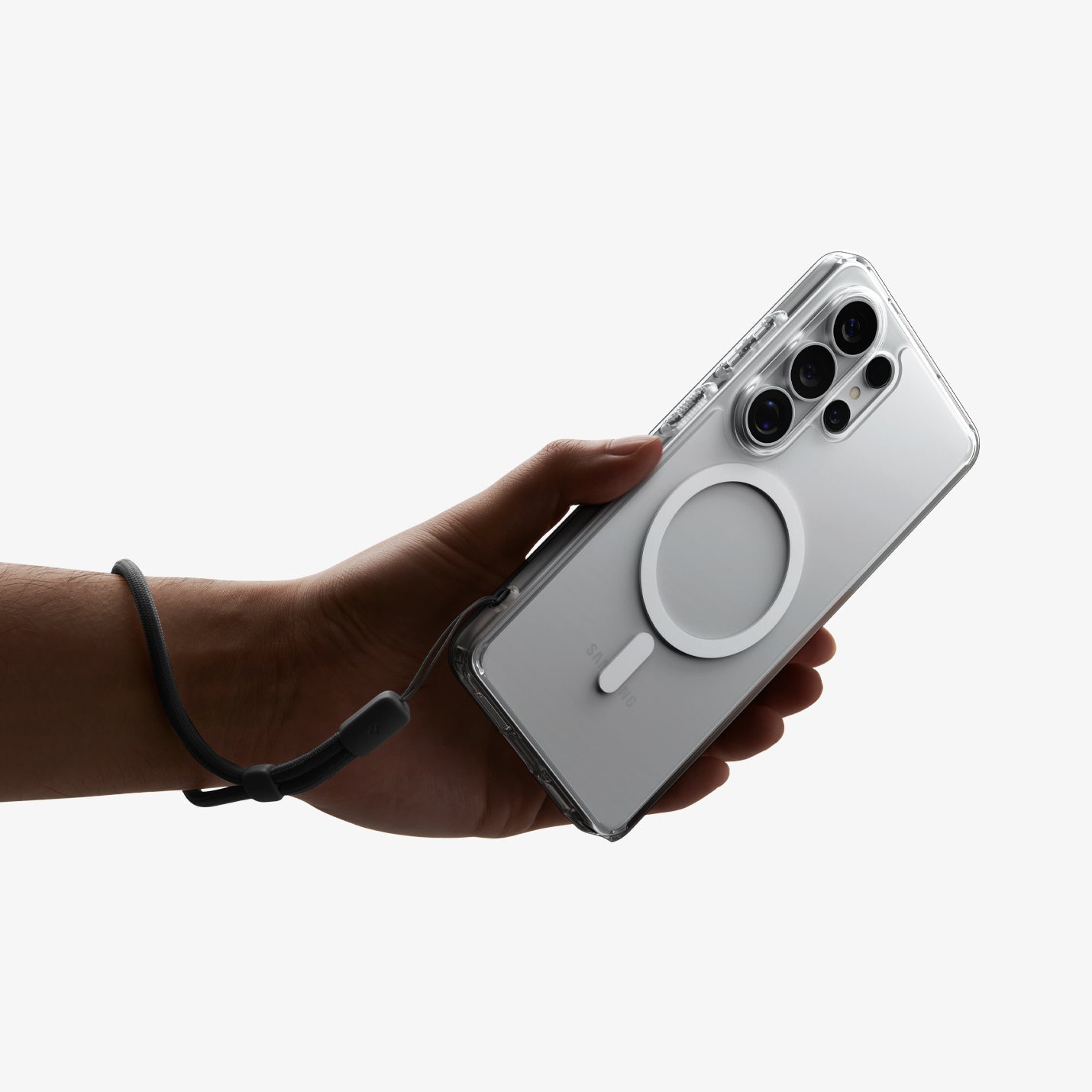 ACS10958 - Galaxy S26 Ultra Case Ultra Hybrid (Mag Fit) Crystal Clear showing a hand with strap on with the device and case