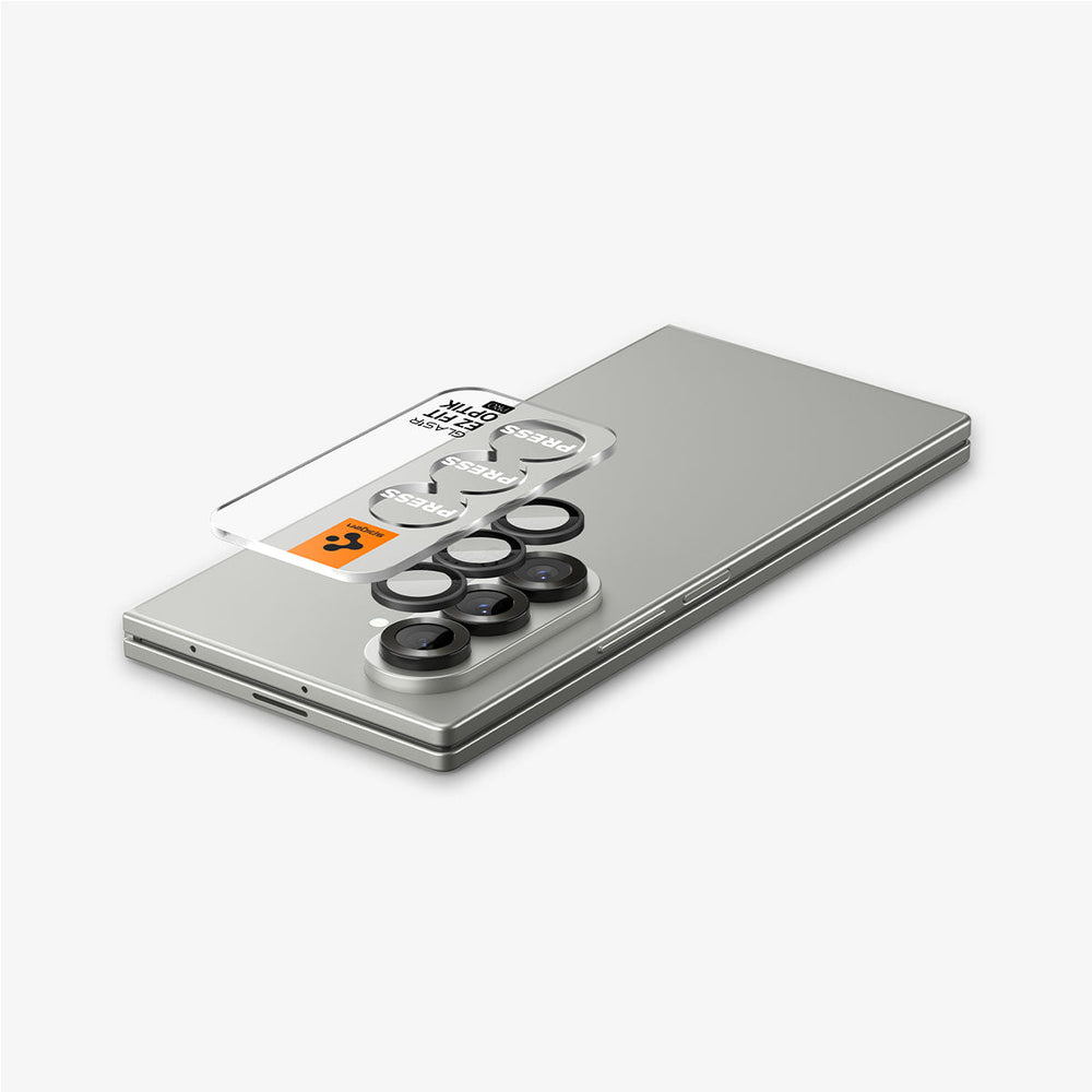 AGL09578 - Galaxy Z Fold 8 Ultra Optik Pro EZ Fit showing a top-down view of the Galaxy Z Fold 8 Ultra in Gray, with the Optik Pro EZ Fit lens protector positioned above the triple camera lenses, 