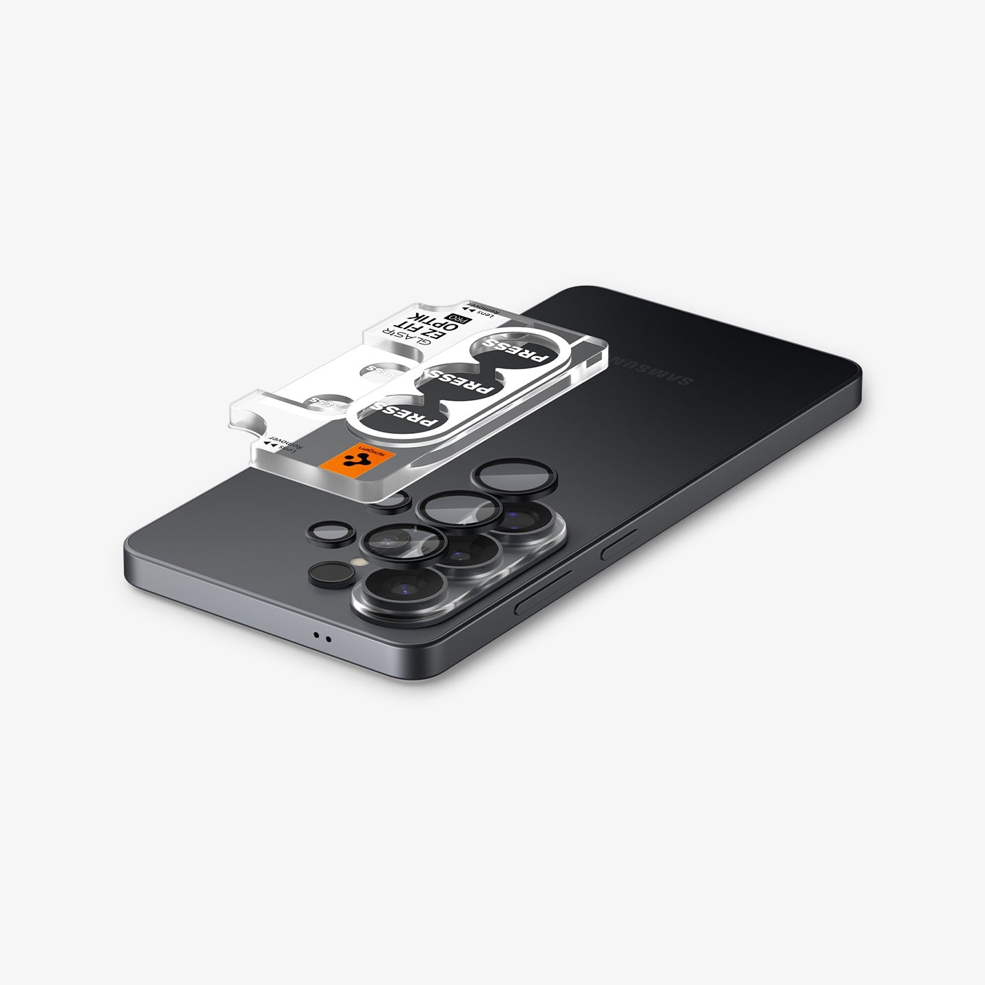 AGL11071 - Galaxy S26 Ultra Optik EZ Fit Lens Pro Protector showing the lens protector tray hovering above the lens protector and the device
