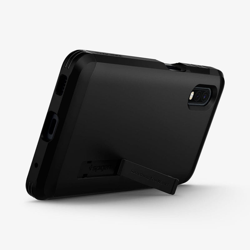 ACS01071 - Galaxy XCover Pro Tough Armor Case in black showing the back and bottom with device propped up by built in kickstand