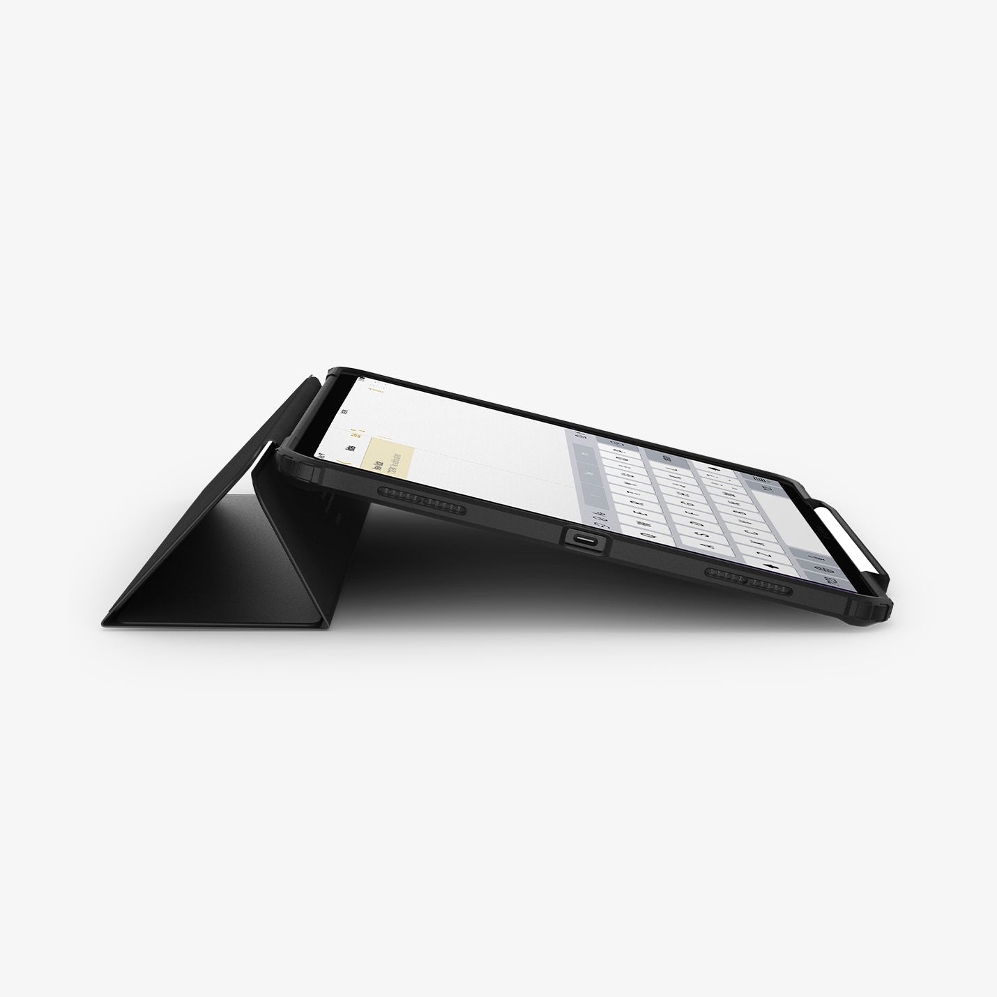 ACS07674 - iPad Air 12.9-inch Case Ultra Hybrid Pro in Black showing the bottom and partial front with device propped up by built in kickstand with s-pen attached