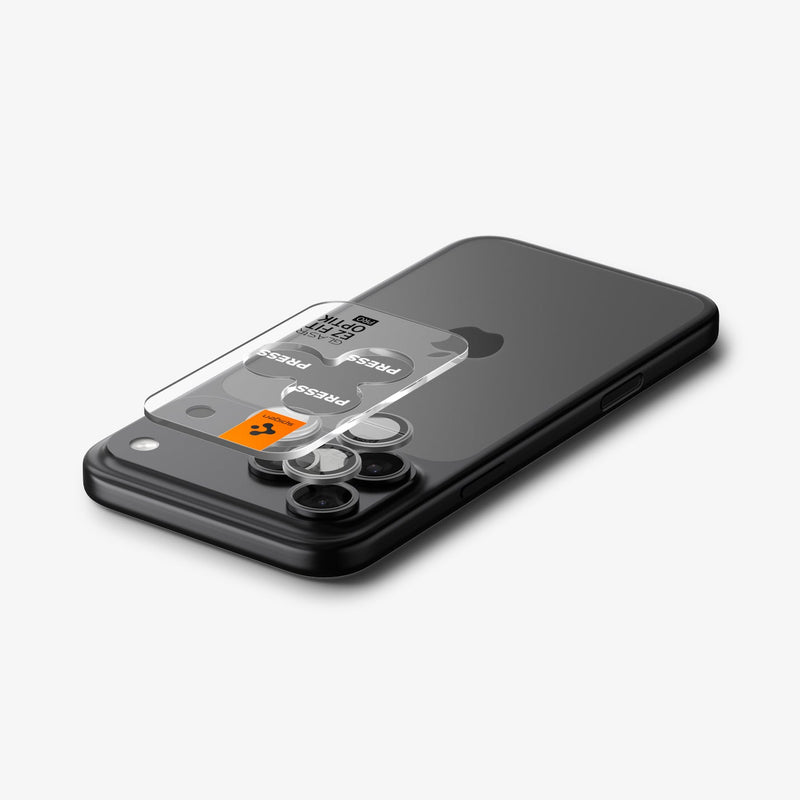 AGL10125 - iPhone 17 Pro Max Optik Pro EZ Fit Lens Protector in gray showing the ez fit tray hovering above the camera lens