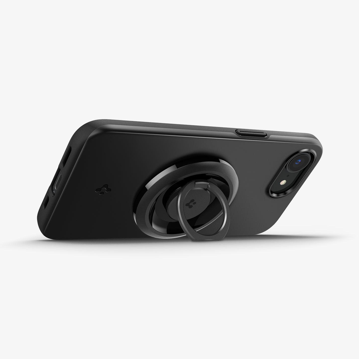 ACS09135 - iPhone 16e Case Thin Fit (MagFit) in Black showing the back, partial side with o-mag ring installed, propped up as a stand