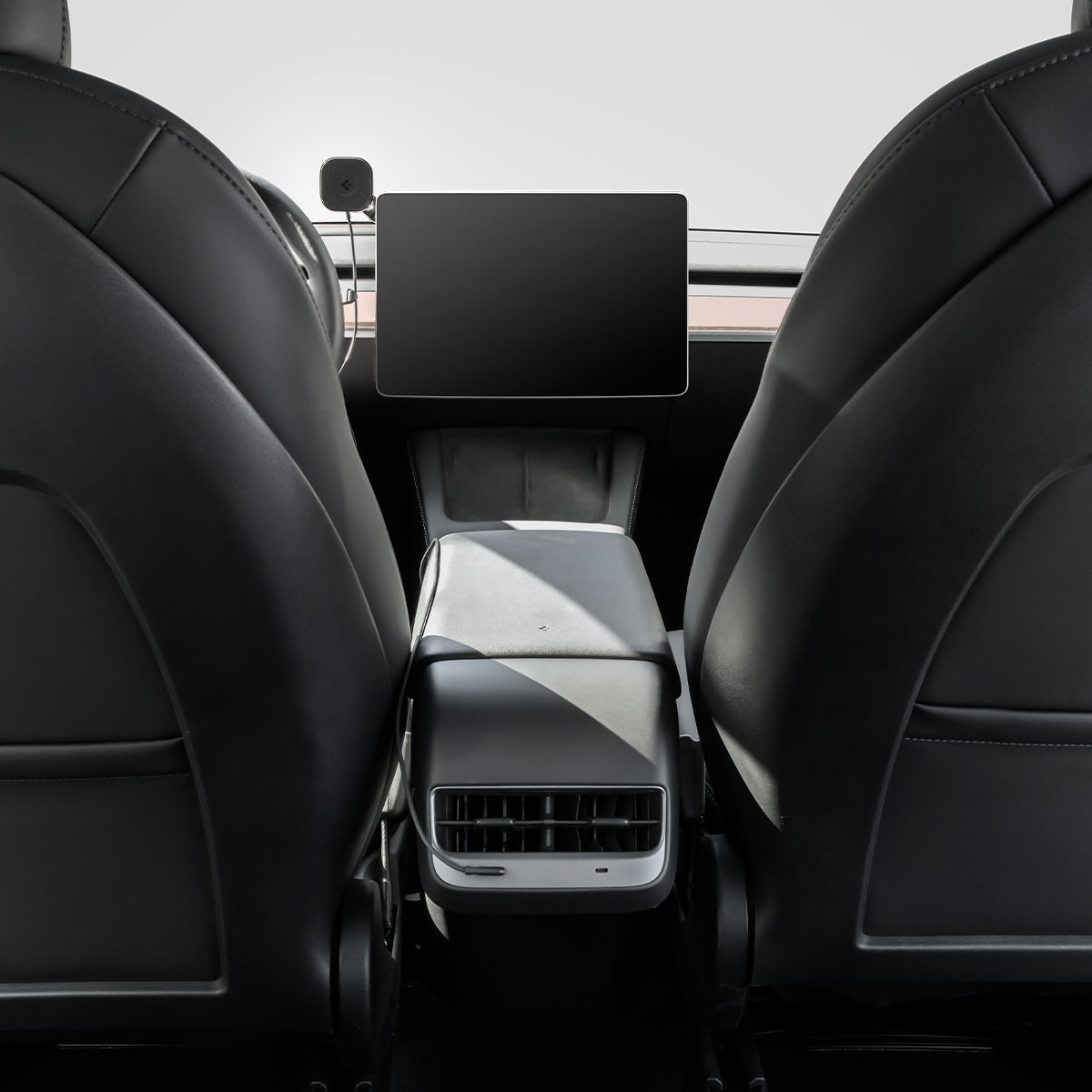 ACP06860 - Tesla Models - OneTap Pro Screen Car Mount ITT90W-3 (MagFit) in Black showing the center of a car inside with a screen car mount attached to a device