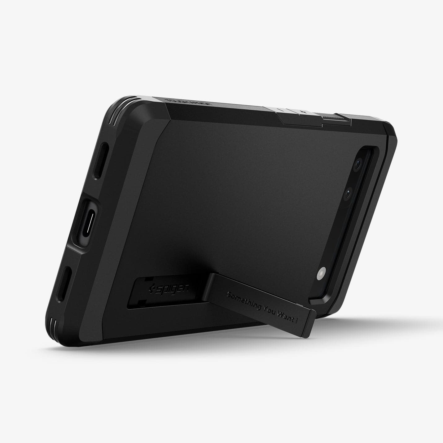 ACS04479 - Pixel 6a Case Tough Armor in black showing the back and bottom with device propped up horizontally by built in kickstand