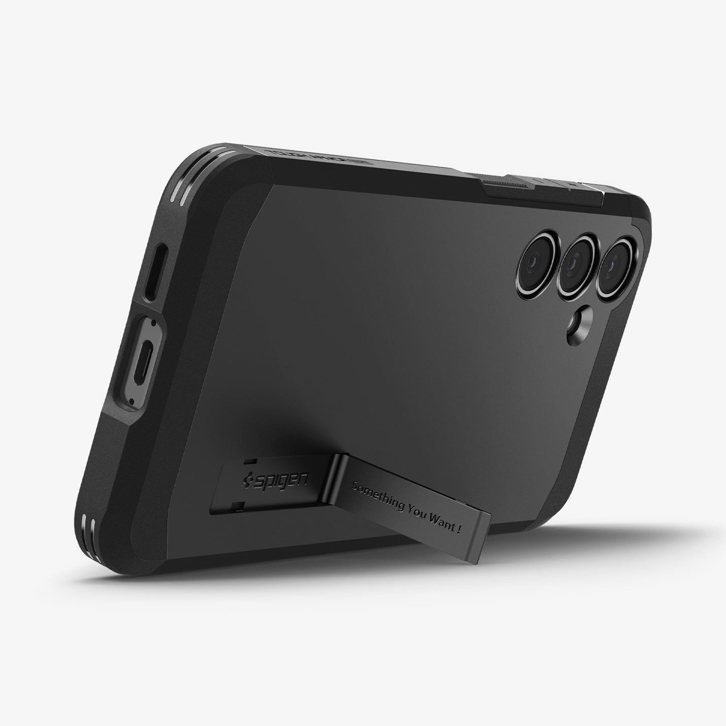 ACS08625 - Galaxy S24 FE Case Tough Armor (MagFit) in Black showing the back, bottom and partial side with a propped up built-in kickstand