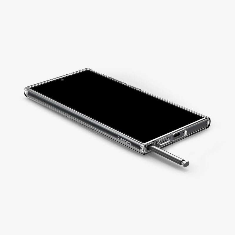 ACS07191 - Galaxy S24 Ultra Case Ultra Hybrid in Crystal Clear showing the front of device, on a flat surface with stylus pen sticking out