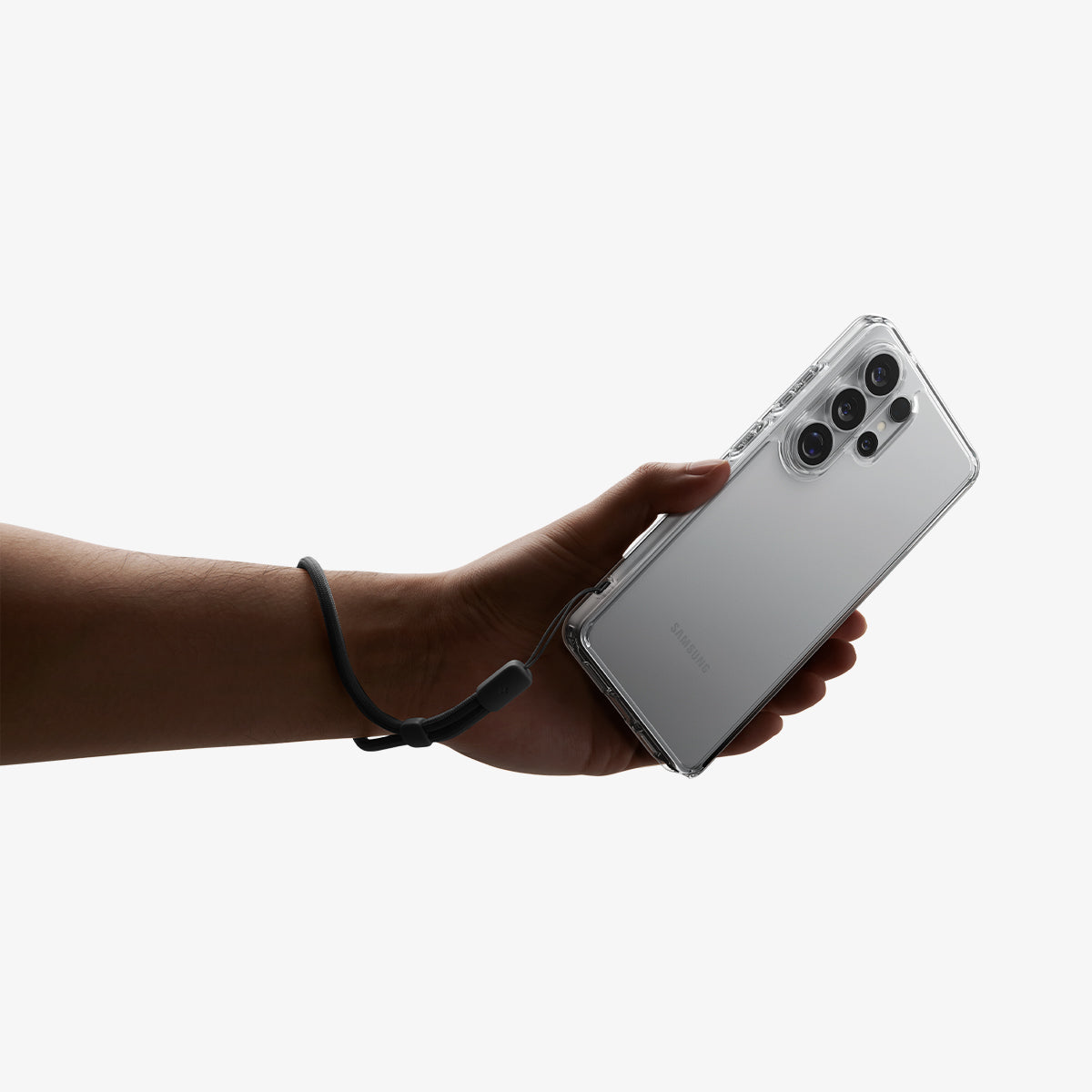 ACS11030 - Galaxy S26 Ultra Case Ultra Hybrid Crystal Clear showing a hand with strap on with the device and case