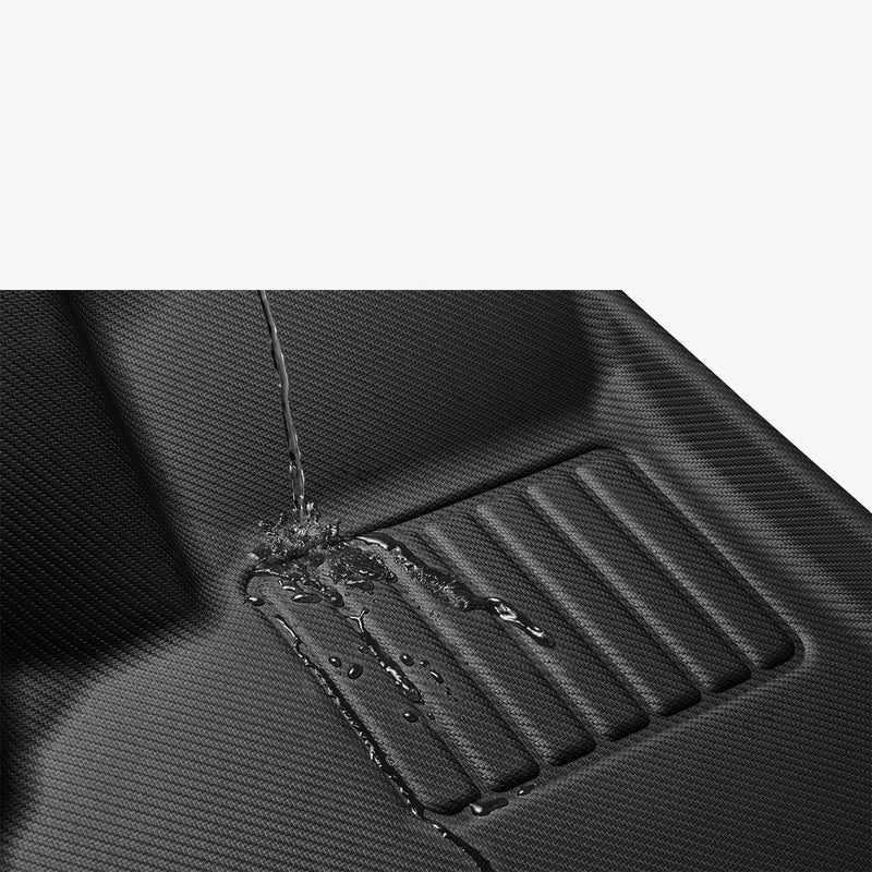 ACP07578 - Tesla Model 3 Highland WeatherBloc Floor Mat TLF-3H in Black showing the water resistant test