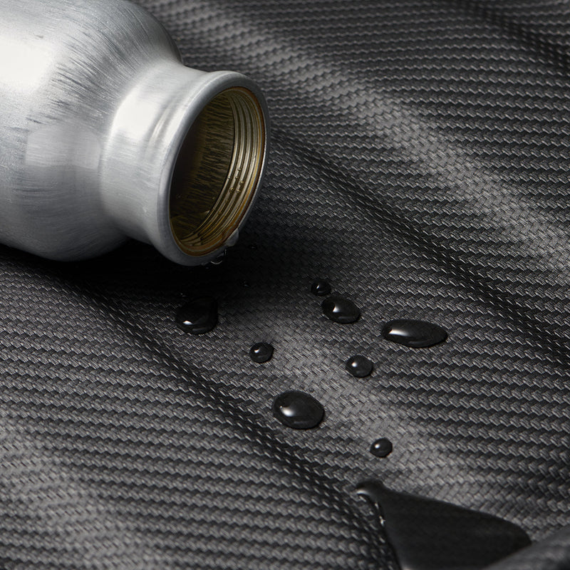 ACP07612 - Tesla Model 3 Highland Trunk Mat Liner TLT-3H in Black showing the spilled water onto the surface proven it's water resistant