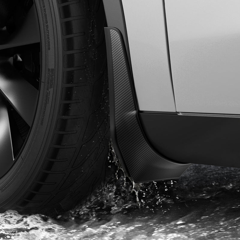 ACP04512 - Tesla Model Y WeatherBloc Mud Flaps showing the mud flaps installed and water hitting it