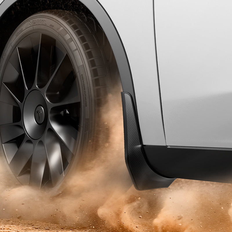 ACP04512 - Tesla Model Y WeatherBloc Mud Flaps showing the mud flaps installed and dirt hitting it