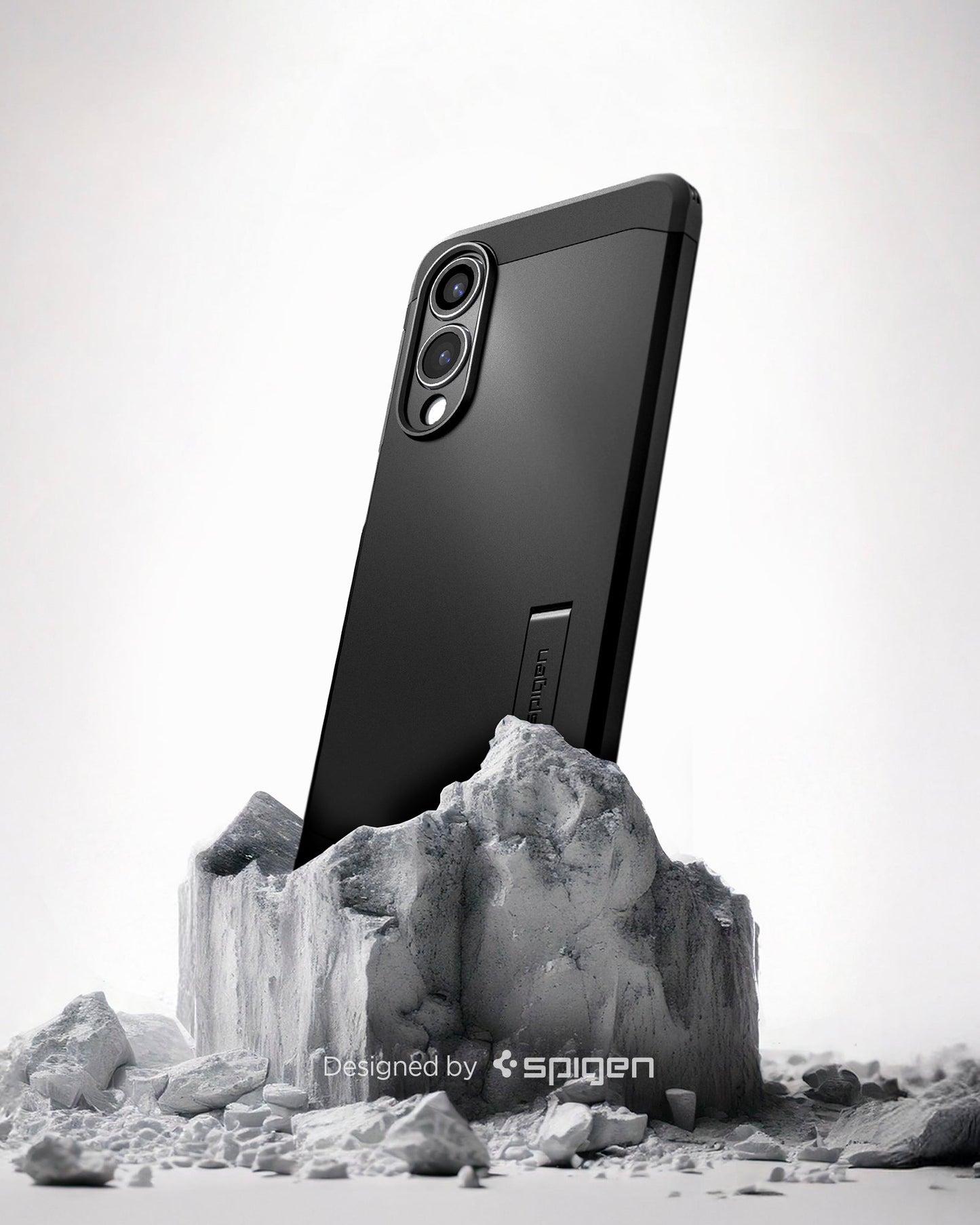 ACS09422 - Galaxy S25 Edge Case Tough Armor AI (MagFit) in Black showing the back and partial side, device sitting on the rock